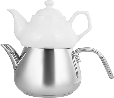Ensemble théière karaka en acier inoxydable et théière en porcelaine. DIAYTAR COTE D'IVOIRE est la boutique en ligne la plus populaire en Cote d'Ivoire, avec une large gamme de produits et des prix compétitifs. La boutique offre une expérience d'achat en ligne agréable et pratique.