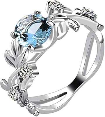 Une bague plaquée en alliage d'argent décorée de cristaux bleus pour femmes