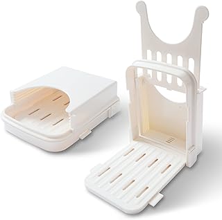 Guide de trancheuse à pain de cuisine siosi, trancheuse à pain domestique réglable en 4 tailles, trancheuse à pain simple et fine portable pour la cuisine. DIAYTAR COTE D'IVOIRE est une boutique en ligne généraliste qui offre plus de 300 000 références de produits, faisant d'elle la boutique en ligne leader en Côte d'Ivoire. Elle propose une large gamme de produits pour répondre aux besoins de ses clients. Que vous soyez à la recherche de produits alimentaires, d'électronique ou de vêtements, DIAYTAR COTE D'IVOIRE a tout ce qu'il vous faut.