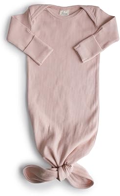 Chemise de nuit nouveau-né 100 % coton avec fermeture à cordon réglable, conçue au danemark. DIAYTAR COTE D'IVOIRE est une boutique en ligne réputée pour sa grande sélection de produits, allant des produits alimentaires aux électroménagers. Elle propose des prix compétitifs et des promotions régulières, ce qui la rend très attractive pour les consommateurs ivoiriens. Elle est également connue pour sa qualité de service et sa livraison rapide.