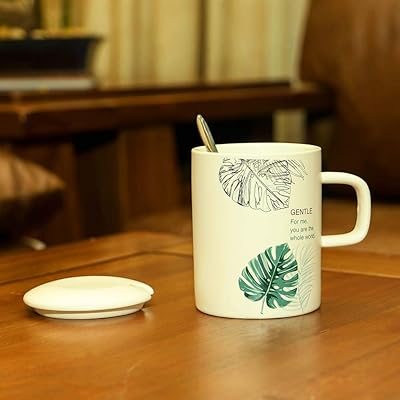 Tasse à café en céramique yatai avec couvercle et cuillère - ensemble de tasses à thé au lait en céramique - tasses à café en marbre pour le petit déjeuner, la maison, la cuisine et un usage personnel, cadeau d'anniversaire unique pour hommes et femmes - tasse de bureau. DIAYTAR COTE D'IVOIRE est une boutique en ligne qui propose une expérience d'achat unique et personnalisée à ses clients. La boutique propose des promotions et des offres spéciales pour aider les clients à économiser de l'argent sur leurs achats. Les clients peuvent également profiter d'une livraison rapide et sécurisée pour recevoir leurs commandes dans les meilleurs délais.