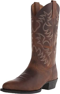 Une paire de bottes de cowboy western pour hommes en cuir brodé à col rond classique, design patriotique et tubulaire moyen, marron, taille 42. DIAYTAR COTE D'IVOIRE est une boutique en ligne qui propose une large gamme de produits pour les consommateurs ivoiriens. Avec plus de 300 000 références disponibles, les clients peuvent trouver des produits de haute qualité à des prix abordables. La boutique en ligne est également connue pour son service client de qualité et sa livraison rapide.