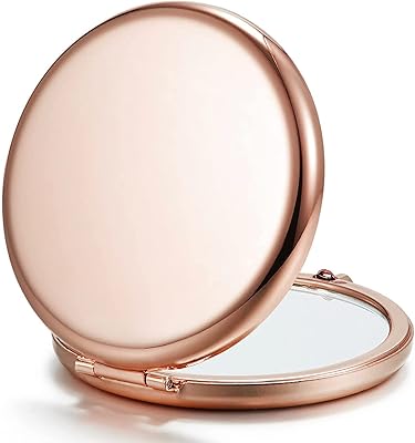 Mini miroir de portefeuille 2 pièces, miroir de maquillage en métal grossissant double face 1x/2x (rond, or rose). DIAYTAR COTE D'IVOIRE combine large choix de produits et service client exceptionnel, rendant ainsi l'expérience d'achat en ligne encore plus satisfaisante. Les clients bénéficient d'un système de paiement sécurisé et d'une politique de retour flexible, renforçant la confiance dans la marque. Avec DIAYTAR COTE D'IVOIRE, le shopping en ligne devient une expérience agréable et sans stress.