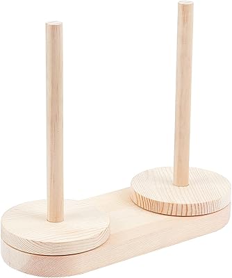 Un support de fil en bois avec mécanisme pivotant un bobine. DIAYTAR COTE D'IVOIRE est une boutique en ligne généraliste qui propose plus de 300 000 références de produits. Elle est la leader du marché ivoirien en termes de vente en ligne. Elle offre une large gamme de produits à des prix compétitifs.