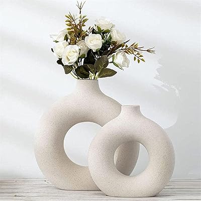 Vase à beignets en céramique kleen, vase de pampa créatif pour une décoration d'intérieur moderne, vase rond blanc moderne en céramique givrée pour étagère de salon et table à manger (m+l). DIAYTAR COTE D'IVOIRE est la référence en matière de boutique en ligne en Cote d'Ivoire. Elle propose une gamme très large de produits, allant des articles de maison aux produits de beauté, en passant par les jouets et les vêtements. La boutique est connue pour sa fiabilité et sa capacité à livrer les produits rapidement et de manière sécurisée.