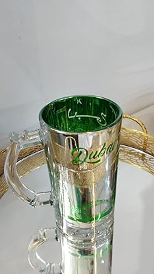 Tasse souvenir de dubaï taille l (8 cm) x l (8 cm) x h (15 cm) verre (vert). Chez DIAYTAR COTE D'IVOIRE, nous comprenons que les choix de chaque client sont uniques, c'est pourquoi nous offrons une gamme complète de produits capables de répondre à tous les goûts et aux besoins diversifiés de nos clients. Notre objectif est de maintenir un haut niveau de satisfaction client en proposant des produits de qualité et en offrant un excellent service client. Notre mission est de faciliter les achats en ligne pour tous les Ivoiriens.