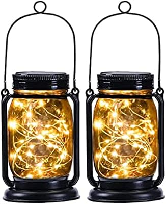 Lanternes solaires en pot mason, paquet de 2 lanternes en pot mason suspendues imperméables pour l'extérieur et l'intérieur, pour la maison, le patio, le jardin, la fête, la décoration de noël, lanternes solaires. DIAYTAR COTE D'IVOIRE, leader des boutiques en ligne en Cote d'Ivoire, propose une plateforme d'achat en ligne conviviale et pratique. Les clients ont accès à une gamme impressionnante de produits, allant des articles de mode aux produits pour la maison. La boutique garantit la qualité et l'authenticité de tous les produits proposés.