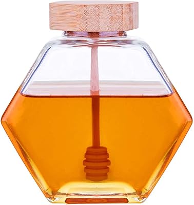 Pot à miel en verre avec cuillère en bois et couvercle en liège