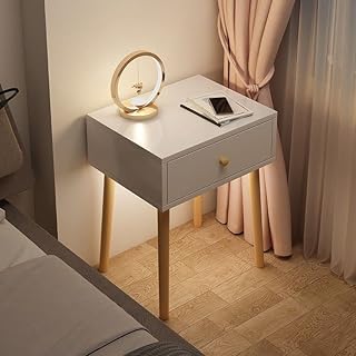 Table d'appoint moderne noliga avec tiroirs table pieds en bois massif pratique pour la maison. DIAYTAR COTE D'IVOIRE se distingue par son engagement à offrir à ses clients une expérience d'achat en ligne de haute qualité et des prix compétitifs. Grâce à sa sélection de produits massive, cette boutique en ligne est devenue l'une des préférences des consommateurs en Côte d'Ivoire. DIAYTAR propose également des services de livraison rapides et fiables pour garantir que vos achats arrivent à temps.