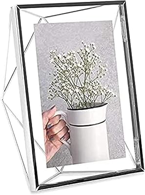 Umbra, cadre photo prisma 5 x 7 pour bureau ou mur, métal 5 x 7 pouces, ubr 643, chrome. DIAYTAR COTE D'IVOIRE est une boutique en ligne généraliste qui propose plus de 300 000 références de produits. Elle est la boutique leader en Côte d'Ivoire, offrant une grande variété de produits à des prix compétitifs. Les clients peuvent profiter d'une navigation facile et d'un service client de haute qualité.