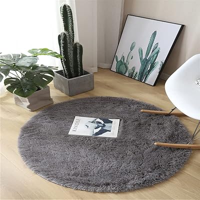 Tapis rond doux et moelleux, tapis de chambre rond, tapis de sol rond en velours pour décoration de chambre d'enfant (gris). DIAYTAR COTE D'IVOIRE, c'est plus de 300 000 références disponibles en ligne, pour répondre à tous vos besoins. En tant que leader du e-commerce en Cote d'Ivoire, nous offrons une sélection incroyable de produits. Notre boutique en ligne est votre destination pour tout ce dont vous avez besoin.