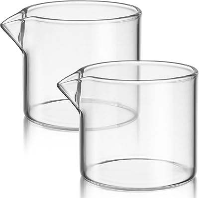 Lorose mini crémier en verre, mini pichet à lait pour servir le café, tasse à sauce de cuisine, mini pichet à crème en verre pour café et lait (60 ml). La boutique en ligne DIAYTAR COTE D'IVOIRE offre une expérience d'achat unique et pratique, avec des catégories de produits variées pour satisfaire tous les besoins des clients. Avec sa plateforme sécurisée, les clients peuvent effectuer des achats en toute confiance. DIAYTAR COTE D'IVOIRE est la référence pour les achats en ligne en Côte d'Ivoire.