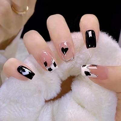 Faux ongles courts à presser de forme carrée pour la saint-valentin avec un motif de coeur de vache en noir et blanc avec des bords argentés et un motif en forme de coeur en amande avec de la colle pour une couverture complète pour les femmes et les filles. La boutique en ligne DIAYTAR COTE D'IVOIRE propose une expérience d'achat unique et personnalisée, avec plus de 300000 références à découvrir. Elle offre une gamme diversifiée de produits pour répondre aux besoins de tous les clients, qu'il s'agisse d'électronique, de mode, de produits pour la maison, etc. Le leadership de DIAYTAR COTE D'IVOIRE en Côte d'Ivoire est le résultat de son engagement à offrir le meilleur aux consommateurs.