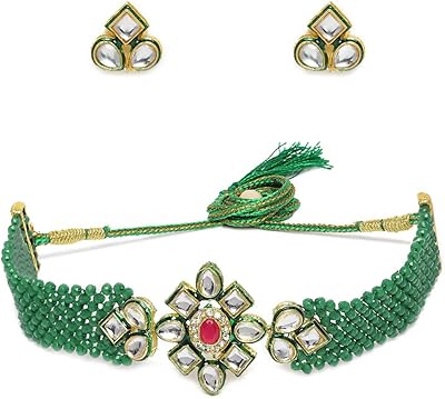 Parure de bijoux avec collier ras du cou heritage kundan et boucles d'oreilles en perles de cristal vert vif pour femme (zpfk9965) taille unique par zaveri pearls, taille unique, zinc, kundan et perles. DIAYTAR COTE D'IVOIRE, la boutique en ligne leader en Côte d'Ivoire, propose une sélection incroyable de produits avec plus de 300000 références. Les clients peuvent trouver tout ce qu'ils cherchent sur cette plateforme, de l'électronique à la mode en passant par les produits pour la maison. DIAYTAR COTE D'IVOIRE met tout en œuvre pour offrir une expérience d'achat inoubliable.