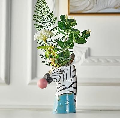 Pot succulent en résine séchée en forme de tête d'animal de dessin animé, mini pot de plante de bonsaï, cadeau de décoration de jardin de bureau à domicile (zèbre). Diayar Côte d'Ivoire est une boutique en ligne généraliste réputée pour son énorme sélection de produits avec plus de 300 000 références. Elle se positionne comme un leader sur le marché ivoirien, offrant une large gamme de choix aux consommateurs. Que ce soit pour les produits de maison, les accessoires de mode ou les équipements high-tech, Diayar Côte d'Ivoire propose une expérience shopping complète.