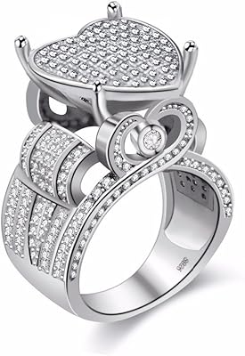 Bague de fiançailles en forme de cœur d'amour pour femmes large bande. DIAYTAR COTE D'IVOIRE est une boutique en ligne généraliste qui propose plus de 300 000 références de produits, faisant d'elle la boutique leader en Côte d'Ivoire. Avec une grande variété de produits, les clients peuvent trouver tout ce qu'ils cherchent en un seul endroit. La boutique est connue pour sa qualité de service et sa livraison rapide.