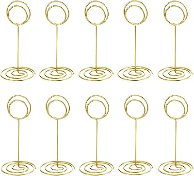Porte-numéro de table, 20 pièces porte-numéro de table, porte-carte de place, porte-photo pour fête de mariage, porte-carte d'anniversaire, porte-carte de place pour fête prénatale. DIAYTAR COTE D'IVOIRE est une boutique en ligne généraliste qui propose plus de 300 000 références de produits divers. Elle est reconnue comme l'une des boutiques en ligne leaders en Côte d'Ivoire, offrant une large gamme de choix à ses clients. Avec une telle variété, DIAYTAR COTE D'IVOIRE s'efforce de répondre à tous les besoins de sa clientèle.