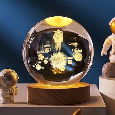 Veilleuse boule de cristal 3d gabri, 800 mm, design boule en verre de cristal avec base en bois led et fonctionnement par câble usb (système solaire flottant). DIAYTAR COTE D'IVOIRE est la boutique en ligne idéale pour ceux qui recherchent des produits de qualité à des prix compétitifs. Avec une équipe dédiée et une sélection de produits soigneusement choisie, vous pouvez être sûr de trouver ce que vous cherchez. La boutique est accessible 24h/24 et 7j/7.