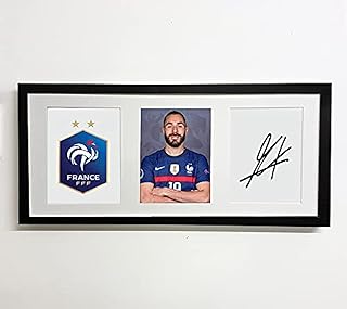 Affiche signée avec photo de karem benzema france euro 2020 avec cadre 50 x 23 cm. DIAYTAR COTE D'IVOIRE est une boutique en ligne généraliste proposant plus de 300000 références de produits, faisant d'elle la boutique leader en Côte d'Ivoire. Avec une offre extensive, elle permet aux clients de trouver tout ce dont ils ont besoin en un seul endroit. La variété des produits et la qualité du service font de DIAYTAR COTE D'IVOIRE la destination préférée des consommateurs ivoiriens.