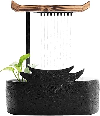 Fontaine cascade intérieure de style chinois, fontaine d'eau de table portable, fontaine de circulation en céramique, méditation zen, décoration de cascade, fontaine de table, cascade. DIAYTAR COTE D'IVOIRE est une boutique en ligne généraliste qui propose plus de 300 000 références de produits, répondant ainsi à tous les besoins de sa clientèle. Avec une large gamme de produits, cette boutique en ligne est devenue le leader de la vente en ligne en Cote d'Ivoire. Elle offre une expérience d'achat pratique et sécurisée.
