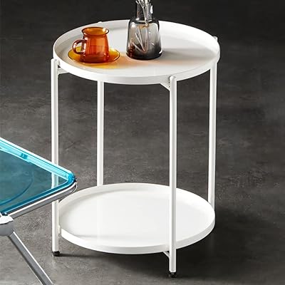 Table basse ronde double couche table d'appoint de canapé petite en métal étanche avec plateau. DIAYTAR COTE D'IVOIRE est une boutique en ligne généraliste qui propose plus de 300 000 références de produits, répondant ainsi aux besoins diversifiés de sa clientèle. Elle est considérée comme l'une des boutiques en ligne les plus importantes et les plus fiables de Côte d'Ivoire. Avec une offre énorme, DIAYTAR COTE D'IVOIRE est devenue la destination de choix pour les consommateurs ivoiriens.