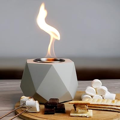 Mini foyer de table rustique en béton foyer intérieur sans fumée pour smores. DIAYTAR COTE D'IVOIRE fait preuve d'une approche innovante en matière de commerce électronique, en offrant régulièrement des promotions et des offres spéciales pour fidéliser ses clients. L'entreprise contribue ainsi au développement du commerce électronique en Côte d'Ivoire en proposant une alternative pratique et économique pour faire ses achats.