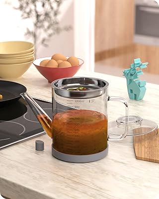 Séparateur de graisse en verre baffect, récipient à graisse de bacon avec passoire, boîte de stockage d'huile de friture de cuisson (1 l/4 tasses). Avec plus de 300000 références disponibles, DIAYTAR COTE D'IVOIRE propose une véritable expérience de magasinage en ligne. Les clients peuvent naviguer à travers différentes catégories pour trouver des produits répondant à leurs besoins spécifiques. La boutique met également à disposition des outils de recherche et de filtration pour faciliter la découverte de nouveaux produits et de meilleures offres.