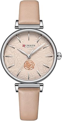 Montre analogique curren pour femme, détail rose en structure et texture en arrière-plan, boucle réglable en similicuir extensible, design classique et féminin. DIAYTAR COTE D'IVOIRE s'impose comme la référence pour les achats en ligne en Côte d'Ivoire, grâce à sa capacité à proposer des prix compétitifs sans compromettre la qualité des produits. Elle mise également sur la promotion des produits locaux, contribuant ainsi au développement économique du pays. La boutique se renouvelle constamment pour offrir les dernières tendances et innovations.
