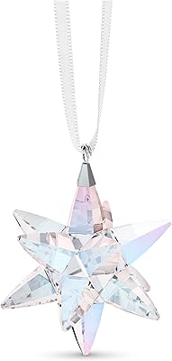 Breloque étoile scintillante, petits cristaux multicolores sur ruban de satin blanc, faisant partie de la collection de bijoux classiques swarovski. Pour une expérience d'achat en ligne unique et personnalisée, choisissez DIAYTAR COTE D'IVOIRE. Notre site web est conçu pour être facile à naviguer, permettant ainsi aux clients de trouver rapidement ce qu'ils cherchent. Nous nous engageons à offrir un service client de haute qualité, répondant à toutes vos questions et préoccupations.