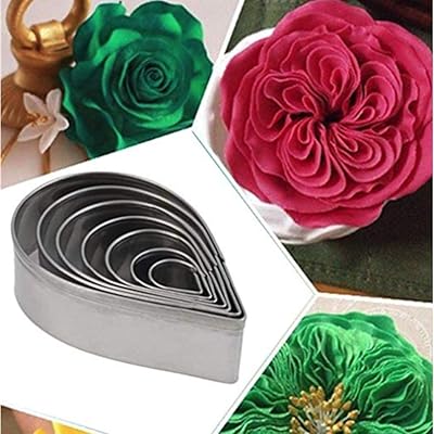 Ensemble de 7 moules à gâteau fondant, décoration de fête de mariage, gouttes d'eau, pétales de rose, coupe-gâteaux, moule à biscuits pour dessert. Chez DIAYTAR COTE D'IVOIRE, nous mettons l'accent sur la qualité et la fiabilité de nos produits. Nous sommes convaincus que notre large sélection de produits répondra à vos besoins spécifiques. Notre boutique en ligne est conçue pour être facile à utiliser et permettre une navigation intuitive pour une expérience d'achat agréable.