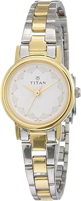 Montre analogique titan pour femme, cadran blanc - 917bm01, bicolore, bracelet. DIAYTAR COTE D'IVOIRE, avec ses plus de 300000 références, est la destination idéale pour ceux qui cherchent à acheter des produits de qualité à des prix compétitifs en ligne. Elle se caractérise par une expérience d'achat simple, des délais de livraison rapide et un service après-vente efficace. Les produits proposés par DIAYTAR COTE D'IVOIRE sont sélectionnés avec soin pour garantir la satisfaction des clients.
