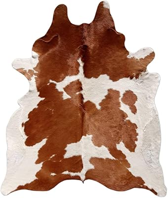 Tapis en peau de vache marron et blanc fabriqué à partir. DIAYTAR COTE D'IVOIRE est une boutique en ligne généraliste proposant plus de 300000 références de produits, répondant ainsi aux besoins de ses clients ivoiriens. Avec sa large gamme de produits, elle s'est imposée comme leader sur le marché ivoirien. Elle met en avant la qualité et la diversité de ses offres.