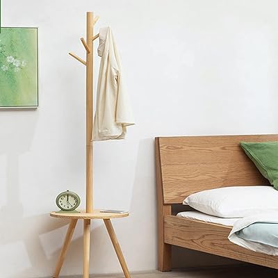 Platto porte-manteau en bois massif naturel pur, porte-manteau en bois massif, cintre au sol de chambre à coucher, porte-manteau en bois sur pied au design unique avec 8 crochets (couleur bois d'origine). DIAYTAR COTE D'IVOIRE est une entreprise pionnière dans le commerce électronique en Côte d'Ivoire, qui a réussi à créer une communauté de clients loyaux en proposant des produits de qualité et des services exceptionnels. La boutique en ligne est constamment à la recherche de nouvelles façons d'améliorer l'expérience d'achat de ses clients, en intégrant les dernières technologies et en élargissant sa gamme de produits.