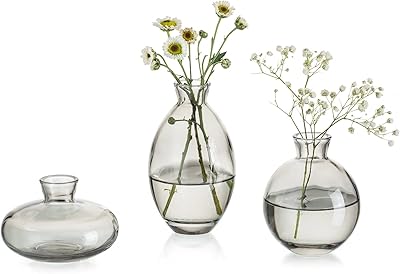 Vase à bourgeons en verre gris 3 pièces ensemble mini vases. DIAYTAR COTE D'IVOIRE est une boutique en ligne généraliste qui propose plus de 300 000 références de produits diversifiés. Elle est devenue la référence incontournable en Côte d'Ivoire pour les achats en ligne. Avec une large sélection de produits, DIAYTAR COTE D'IVOIRE répond aux besoins de tous les consommateurs.
