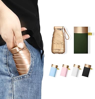 Mini parapluie de poche, petits parapluies pliants de voyage, conception légère, imperméable et résistant aux uv, petit et portable, peut être mis dans votre poche personnelle. DIAYTAR COTE D'IVOIRE est la boutique en ligne idéale pour tous vos besoins, avec une offre de produits diversifiée et une expérience client satisfaisante. Elle propose des produits de qualité, à des prix abordables, et avec des options de livraison rapides. En tant que leader du commerce électronique en Côte d'Ivoire, elle est la destination privilégiée pour les acheteurs en ligne.