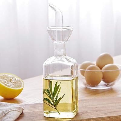 Bouteille d'huile en verre pour distributeur d'huile d'olive, distributeur d'huile de cuisson et de vinaigre en verre avec buse pour cuisine et barbecue (125 ml/4,8 oz). DIAYTAR COTE D'IVOIRE, boutique en ligne généraliste avec plus de 300000 references, est la destination idéale pour tous vos besoins de shopping en ligne. Elle offre une large gamme de produits allant de l'électronique à la mode en passant par les produits pour la maison. La boutique leader en Cote d'Ivoire assure une livraison rapide et sécurisée.
