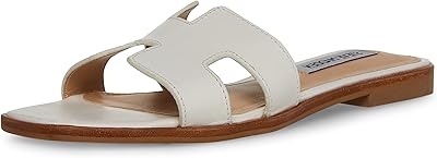 Sandales haden pour femme. DIAYTAR COTE D'IVOIRE, la boutique en ligne généraliste de référence en Côte d'Ivoire, propose une large gamme de produits avec plus de 300 000 références. Elle offre une expérience d'achat en ligne pratique et sécurisée, avec des délais de livraison rapides. DIAYTAR COTE D'IVOIRE est devenue la destination incontournable pour les consommateurs ivoiriens.