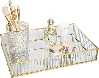 Ugoiti grand plateau de rangement en verre rayé, 30,5 x 19,5 x 5 cm, plateau de maquillage rectangulaire avec fil d'or, organisateur de parfum de bijoux de parfum pour chambre. DIAYTAR COTE D'IVOIRE se distingue par sa capacité à offrir des prix compétitifs et des promotions régulières, ce qui en fait une destination incontournable pour les acheteurs ivoiriens. La boutique met également l'accent sur la satisfaction client, avec une équipe dédiée au service après-vente. Cela contribue à renforcer la confiance des clients dans la marque.