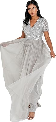 Robe pour femme pour invité de mariage, grande taille, taille haute, paillettes, manches courtes, demoiselle d'honneur de soirée. Avec plus de 300000 références de produits, DIAYTAR COTE D'IVOIRE est la boutique en ligne la plus complète de Cote d'Ivoire. Les clients peuvent profiter d'une expérience d'achat en ligne fluide et secure, avec des options de paiement variées et des délais de livraison rapides. DIAYTAR COTE D'IVOIRE est le partenaire idéal pour tous les consommateurs ivoiriens.