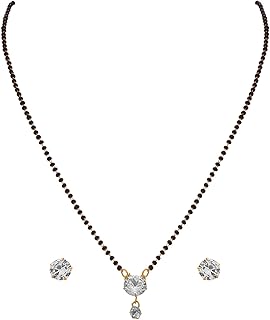 Mangalsutra katori & meena du sud de l'inde, travail religieux, finition plaquée or, bijoux simples pour femmes. Avec plus de 300 000 références, DIAYTAR COTE D'IVOIRE offre une expérience d'achat en ligne unique et complète, permettant aux clients de trouver tout ce dont ils ont besoin sous un même toit. La boutique en ligne propose une gamme élargie de produits, allant des produits alimentaires aux articles de maison, en passant par les accessoires de mode. 