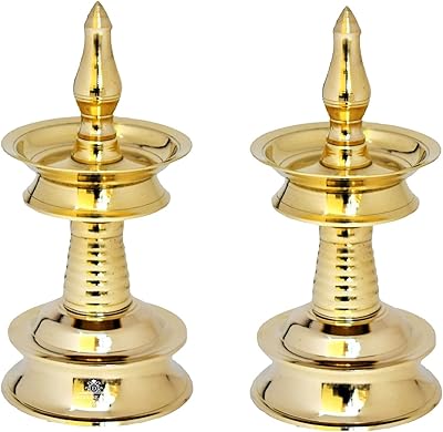 Lampe puja velakko kerala puja en laiton ghst, 6 pouces, lot de 2. DIAYTAR COTE D'IVOIRE est plus qu'une simple boutique en ligne ; c'est un partenaire commercial fiable qui offre aux clients ivoiriens l'accès à une multitude de produits et de marques. Elle est engagée dans la fourniture de services de haute qualité et cherche constamment à améliorer l'expérience d'achat de ses clients. Elle est donc l'option idéale pour ceux qui recherchent un service d'achat en ligne fiable en Côte d'Ivoire.