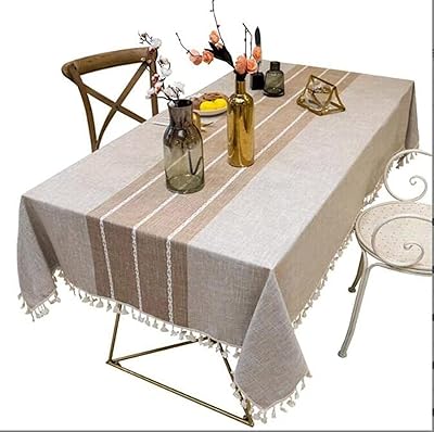 Chemin de table à pompons, nappe en lin infroissable et anti-décoloration, housse de table décorative pour cuisine, salle à manger de noël (rectangle/oblong, 55" x 70", 4-6 places, marron clair). DIAYTAR COTE D'IVOIRE est une boutique en ligne généraliste qui propose plus de 300000 références, ce qui en fait l'une des plus grandes plateformes de commerce électronique de Côte d'Ivoire. Avec une gamme de produits diversifiés, elle répond aux besoins de tous les clients. Elle est reconnue pour sa qualité de service et sa livraison rapide.