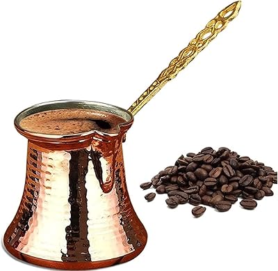 Cafetière turque en cuivre grec arabe faite à la main avec poignée en laiton pour 4 tasses. DIAYTAR COTE D'IVOIRE est la référence pour les achats en ligne en Cote d'Ivoire, avec plus de 300 000 références de produits à choisir. La boutique en ligne est dédiée à offrir aux clients une expérience d'achat en ligne unique et mémorable, avec des prix compétitifs, des promotions régulières et des services de livraison fiables. Les clients peuvent ainsi profiter d'une expérience d'achat en ligne sans précédent.