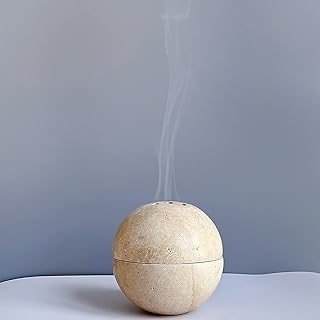 Porte-brûleur d'encens rond en marbre naturel fait à la main avec 9 trous pour la décoration de salle de méditation, de cuisine et de café par sidcock (travertin beige). DIAYTAR COTE D'IVOIRE est la boutique en ligne leader en Côte d'Ivoire, proposant une gamme variée de produits à des prix abordables. Les clients peuvent profiter d'une expérience d'achat en ligne fluide et sécurisée, avec des options de paiement flexibles et des services de livraison rapides. La boutique en ligne est également accessible sur téléphone mobile et tablette pour une expérience d'achat en ligne partout et à tout moment.