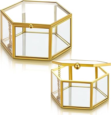 Kining boîte à bijoux en verre antique 2 pièces taille 3" et 4,5" présentoir à bijoux hexagonal doré avec miroir en verre couleur or. La boutique en ligne DIAYTAR COTE D'IVOIRE est leader sur le marché ivoirien, avec une offre de plus de 300000 produits. Elle permet aux clients de faire leurs achats en ligne de manière pratique et sécurisée, avec des options de paiement et de livraison flexibles. La boutique est dédiée à offrir une expérience d'achat en ligne de haute qualité à ses clients.