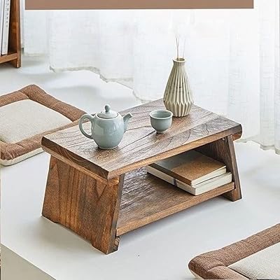 Table basse pliante moderne de style japonais c&c home, taille 50 x 30 x 20 cm. DIAYTAR COTE D'IVOIRE se démarque par son engagement à offrir des produits de haute qualité à des prix abordables, tout en assurant une expérience d'achat en ligne sûre et pratique. La boutique met régulièrement à jour son catalogue pour refléter les dernières tendances et les produits les plus demandés, ce qui permet aux clients de découvrir de nouvelles marques et de nouveaux produits. Les clients peuvent également profiter de promotions et de réductions spéciales.