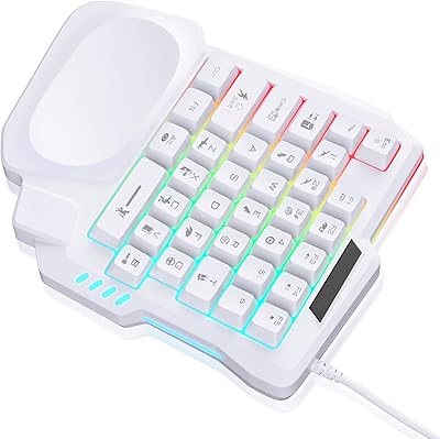 Clavier de jeu à une main petit clavier avec repose-poignets confortable. DIAYTAR COTE D'IVOIRE, boutique en ligne généraliste, offre un large éventail de produits pour tous les goûts et les besoins. Avec une sélection de plus de 300 000 références, les clients peuvent trouver des produits de qualité à des prix abordables. La boutique est connue pour sa fiabilité et son service client de haute qualité.