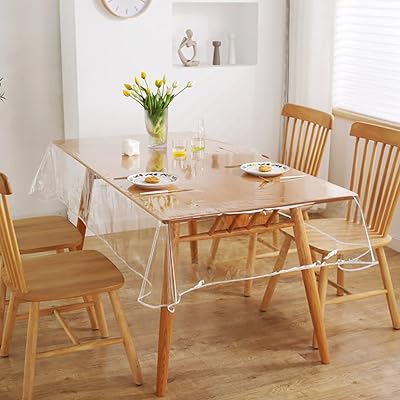 Nappe rectangulaire en pvc transparent de 55 x 70 pouces, essuyable à l'huile et housse de protection imperméable pour table à manger (transparent). DIAYTAR COTE D'IVOIRE, boutique en ligne généraliste de grande envergure, répond parfaitement aux besoins d'une clientèle exigeante, offrant une panoplie de produits du quotidien ainsi que des articles plus exceptionnels. DIAYTAR comprend que le temps est précieux, c'est pourquoi il est possible de commander en toute simplicité et rapidité sur le site. DIAYTAR, c'est la solution idéale pour vos achats en ligne en Côte d'Ivoire !
