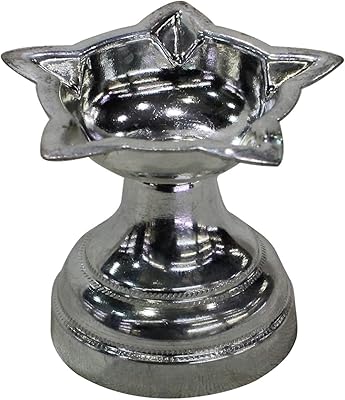 Diya en argent pur | lampe à huile | deepak | pour puja | 27,6 grammes. La boutique en ligne DIAYTAR COTE D'IVOIRE se distingue par son énorme sélection de produits qui va des électroménagers aux vêtements, en passant par les produits high-tech. Avec plus de 300 000 références, les clients ont l'embarras du choix pour trouver ce qu'ils cherchent. DIAYTAR COTE D'IVOIRE est ainsi devenue la référence pour les achats en ligne en Côte d'Ivoire.