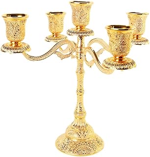 Bougeoir doré à 5 bras, bougeoir turc en or pour bougies piliers et bougies chauffe-plat, bougeoir rétro pour fête de mariage, dîner, centre de table, décoration, cadeau. DIAYTAR COTE D'IVOIRE est la boutique en ligne idéale pour ceux qui cherchent un large choix de produits à des prix compétitifs. Avec des promotions régulières et des offres spéciales, les clients peuvent bénéficier d'économies significatives sur leurs achats. L'équipe de DIAYTAR COTE D'IVOIRE est dédiée à fournir une expérience d'achat en ligne exceptionnelle aux consommateurs ivoiriens.